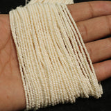 10 Strings, 11`0 Preciosa Seed Beads Off White