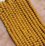 12 Strings, 2mm Chocolate Acrylic Kharbooja Beads_jaunty01_acrb-595