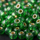 50gm 4/0 Preciosa Golden Emerald Seed Beads
