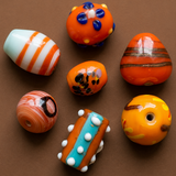 50+ Fancy Beads Orange 8-25mm