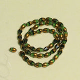 7X9mm Faceted Drop Green Crystal Bead