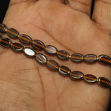 1 String 10X7mm Window Metallic Lining Oval Beads Dark Brown