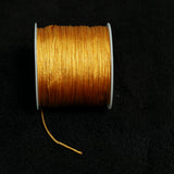 50 Mtr 0.5mm Colored Satin Thread Spool Golden