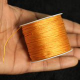 50 Mtr 0.5mm Colored Satin Thread Spool Golden