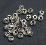 50Gm German Silver Beads 7x4mm