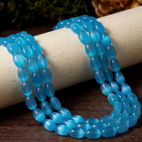 Buy 10x8mm Flat Oval Grey and Sky Blue Monalisa Beads String Online - BeadsnFashion.com