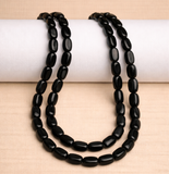 1 String 7X10mm Black Oval Glass Beads