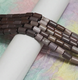 1 String 10x6mm Cat Eye Tube Glass Beads