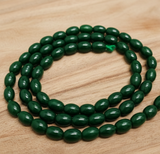1 String 6x4mm Jaipuri Beads Dark Green Oval
