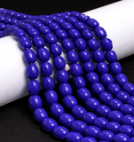 1 String 8x6mm Jaipuri Beads Blue Oval