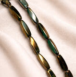1 String 18X5mm Fire Polish Twisty Oval Beads GD