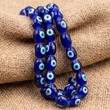 2 Strings, 14x12mm Glass Evil Eye Oval Beads Blue