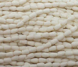 12 Strings, 4x3mm White Acrylic Drop Beads_jaunty01_acrb-593_1