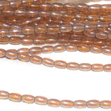 brown luster trans glass oval beads 7x4mm 12 Strings